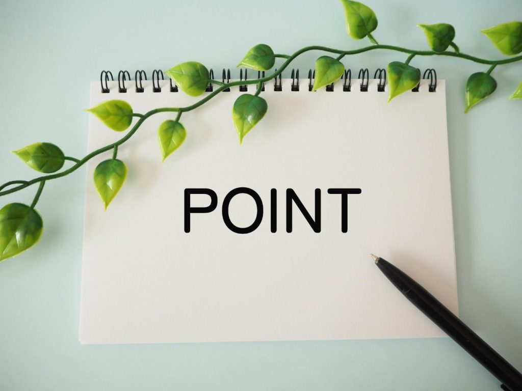 「POINT」と書かれたノートとペン