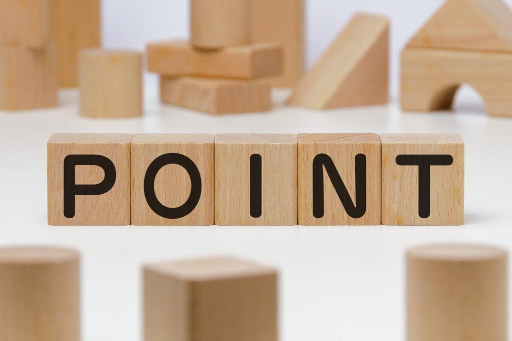 「POINT」と書かれた木のブロック